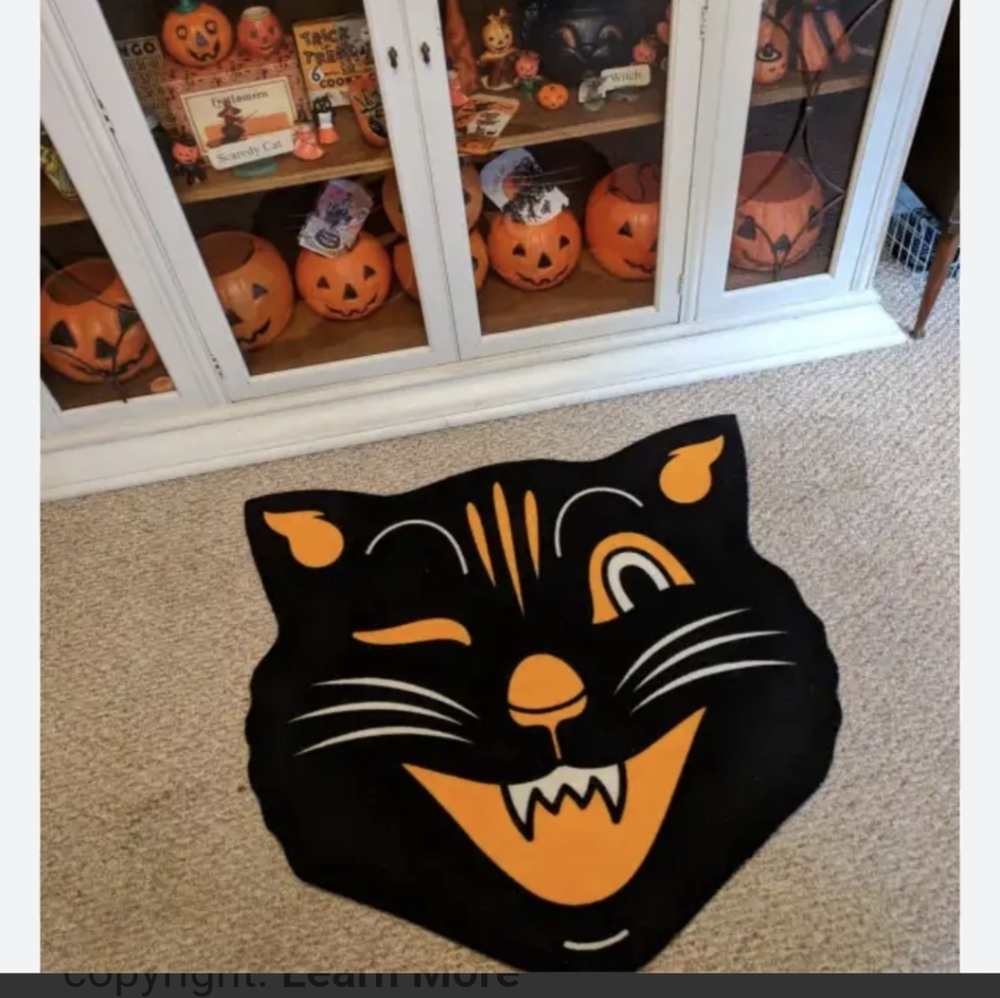 Sourpuss Rug with Black Cat